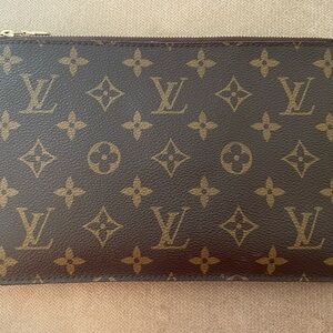 Authentic Louis Vuitton Brown & Gold Monogram Pouch. Excellent used condition.